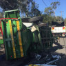 Driver seriously injured after two-truck crash in Sydney's north-west