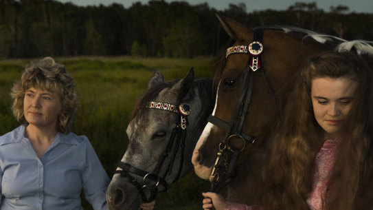 Kim-Leeanne King with her daughter Madeline at her property in Williamtown. 