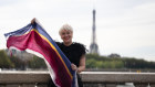 Brisbane Lions director and businesswoman Cathie Reid in Paris this week with her Lions scarf.