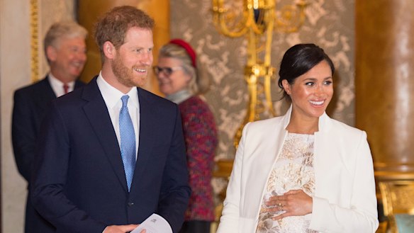 The Sussexes: Harry, Meghan and bump.