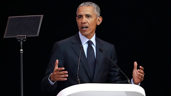 Barack Obama delivers the 16th annual Nelson Mandela Lecture at the Wanderers Stadium in Johannesburg.