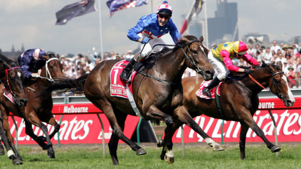 The moment: Glen Boss passes the post on Makybe Diva in the 2005 Melbourne Cup.