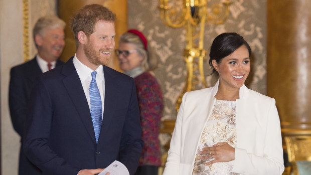 The Sussexes: Harry, Meghan and bump.