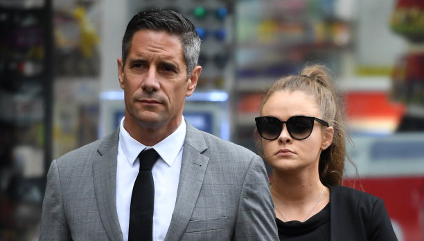 Roman Quaedvlieg and his girlfriend, Sarah Rogers, who has pleaded guilty to misleading a corruption probe against the pair, arrive at the Downing Centre Local Court in Sydney on Wednesday.