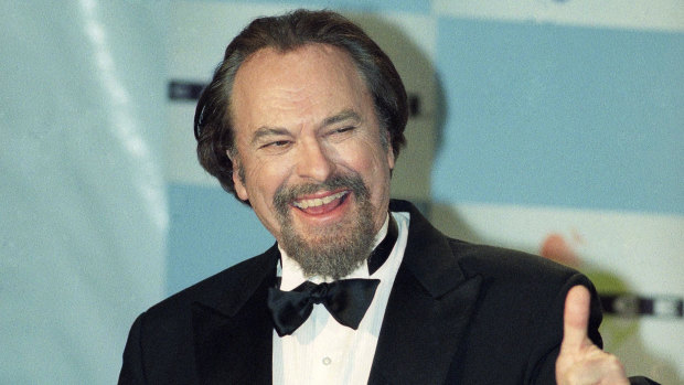 Actor Rip Torn gives a thumbs-up after winning an best actor in a comedy series award for HBO's The Larry Sanders Show in 1995.