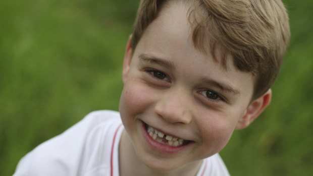 Britain's Prince George poses for a photo taken by his mother, Kate, the Duchess of Cambridge, in the garden of their home at Kensington Palace, London.