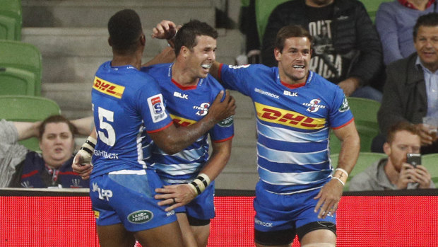 Ruhan Nel celebrates a try with his Stormers teammates.