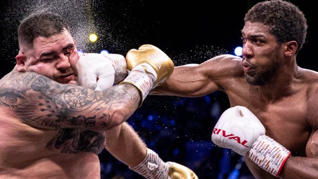 Anthony Joshua, right, punches Andy Ruiz Jr during the ‘Clash on the Dunes’ fight in Saudi Arabia.