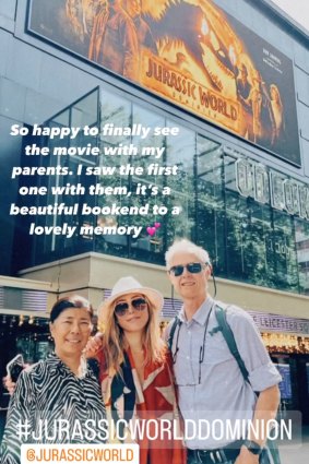 Chris and Tashi Lachman seeing Jurassic World Dominion with daughter Dichen, in which she features. 
