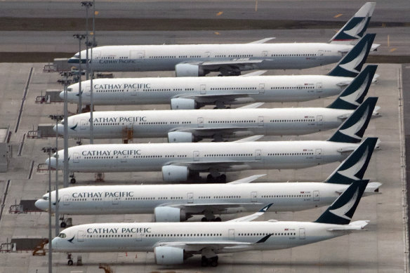 Cathay Pacific aircraft line the tarmac at Hong Kong International Airport