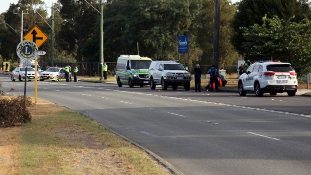 Police and paramedics at the scene of the tragedy on Albany Highway.