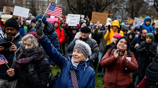 Hundreds of demonstrators gather on Cambridge Common during a rally at the historic park in Cambridge, Mass Massachussetts on Saturday calling on Harvard University to resist what organisers described as attempts by President Donald Trump to influence the institution.