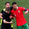 Fans seeking selfies with Ronaldo stop game six times as ‘slapstick’ own goal helps Portugal win