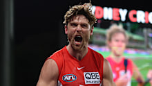 Dane Rampe roars as the Swans surge to their qualifying final win over the Brisbane Lions.