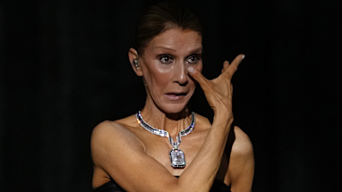 Dion wiped away tears as she made a grand return to performing.