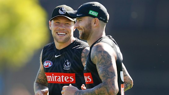 Jordan De Goey (left) with teammate Jeremy Howe at Magpies training on Friday.