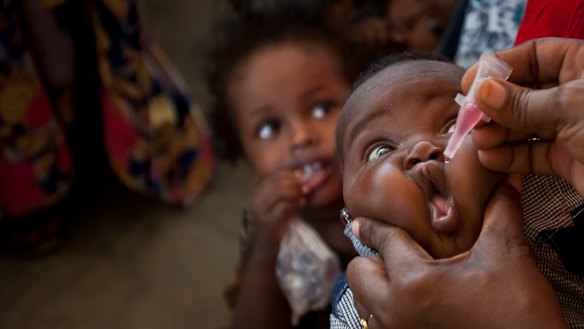 A baby receives a polio vaccine at the Medina Maternal Child Health Centre in Mogadishu, Somalia.