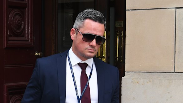 Detective Senior Constable Murray Gentner leaves the Supreme Court on Thursday.