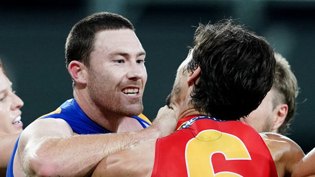Lost appeal: Jeremy McGovern wrestles with Alex Sexton during round two. 