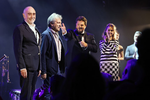 Taking a bow (from left) Claude-Michel Schonberg, Alain Boublil, Michael Ball, Marie Zamora, Sooha Kim (obscured) and Bobby Fox (partly obscured) at Do You Hear The People Sing? at Sydney Opera House.