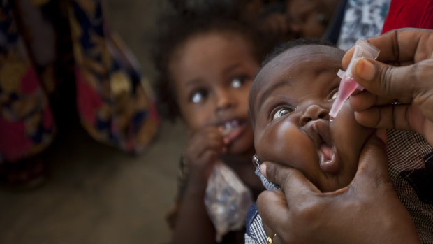 A baby receives a polio vaccine at the Medina Maternal Child Health Centre in Mogadishu, Somalia.