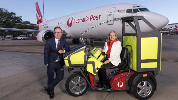 Qantas chief executive Alan Joyce and Australia Post chief executive Christine Holgate.