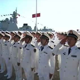 Sailors salute the Chinese President at the launch of the Shandong, China's first home-built aircraft carrier, on December 17, 2019.