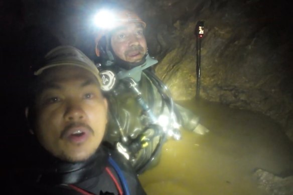 Rescuers working in the flooded cave.