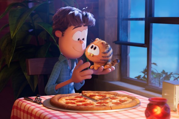 John (voiced by Nicholas Hoult) with baby Garfield in The Garfield Movie.