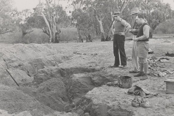 Members of Murray Black’s party at a disturbed burial site circa 1940s or 1950s.