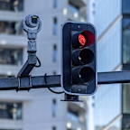 a camera attached to a red light