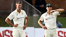Australia’s Beau Webster (left) and Pat Cummins in conversation on day three.
