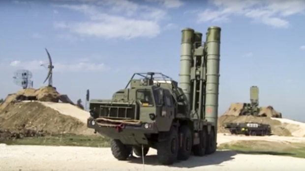 China has also bought technology associated with Russian S-400 air defence missiles, seen here  being deployed at the Hemeimeem air base in Syria.