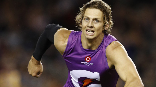 Nat Fyfe has stitches in his elbow after surgery and is in doubt for Fremantle's pre-season clash with West Coast on Sunday.