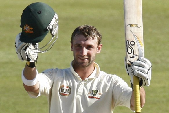 Phillip Hughes celebrates a century against South Africa in 2009.