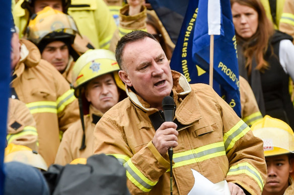 Firefighters union boss Peter Marshall addresses a rally.