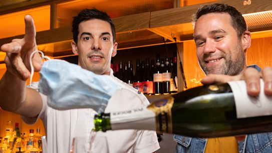 Her head chef Josh Rudd and general manager Tom Byrne are happy about the mask mandate lifting for hospitality staff.