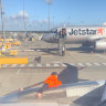 Emergency slide deployed after Jetstar passenger forced open emergency exit door