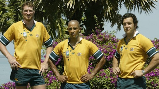 Justin Harrison, George Gregan and Brendan Cannon model a new Wallabies jersey at the teams’ camp in 2003. 