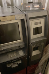 Cryptocurrency teller machines were seized as part of the raid.