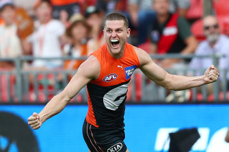 Jacob Hopper celebrates kicking a late goal for the Giants.