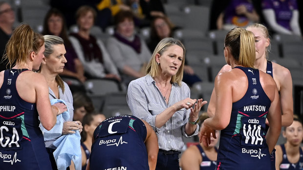 One game to go for premiership glory: Head coach Simone McKinnis (centre) with her Vixens.