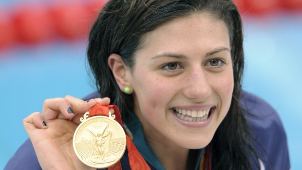 Australia's Stephanie Rice displays her gold medal after the women's 200-meter individual medley final at the 2008 Olympics. 