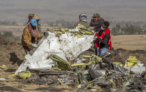 Rescuers at the scene of the Ethiopian Airlines crash, the second MAX tragedy.