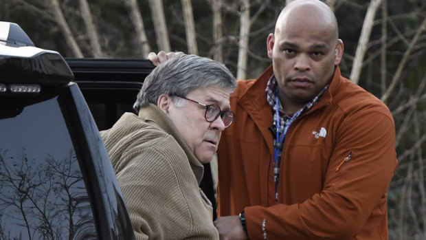 US Attorney General William Barr arrives at his home in Virginia on Saturday evening, facing some momentous decisions.