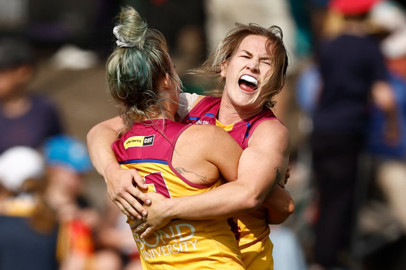 Brisbane Lions celebrate the win over the Adelaide Crows.