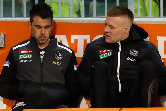 Levi Greenwood (left) and Jordan De Goey were both injured in the win over the Cats.