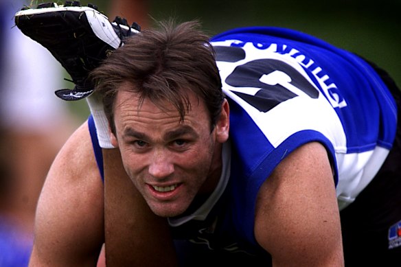Having a crack: David King during his North Melbourne days.