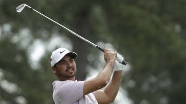 Australia's Jason Day hits on the fourth hole during the second round of the Masters on Friday.