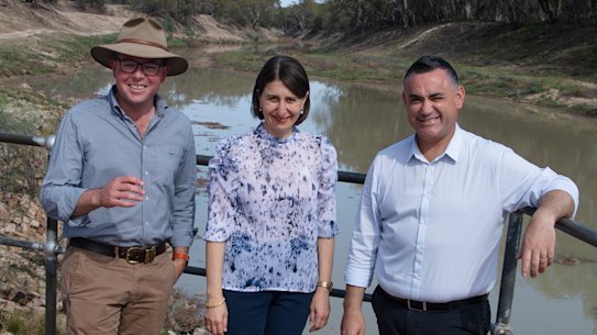 Premier Gladys Berejiklian flanked by Deputy Premier John Barilaro, left, and Adam Marshall.